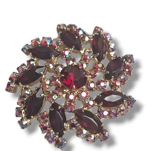 Vintage Gold Tone Red & Red AB Rhinestone Spinner Brooch (Glows Yellow)